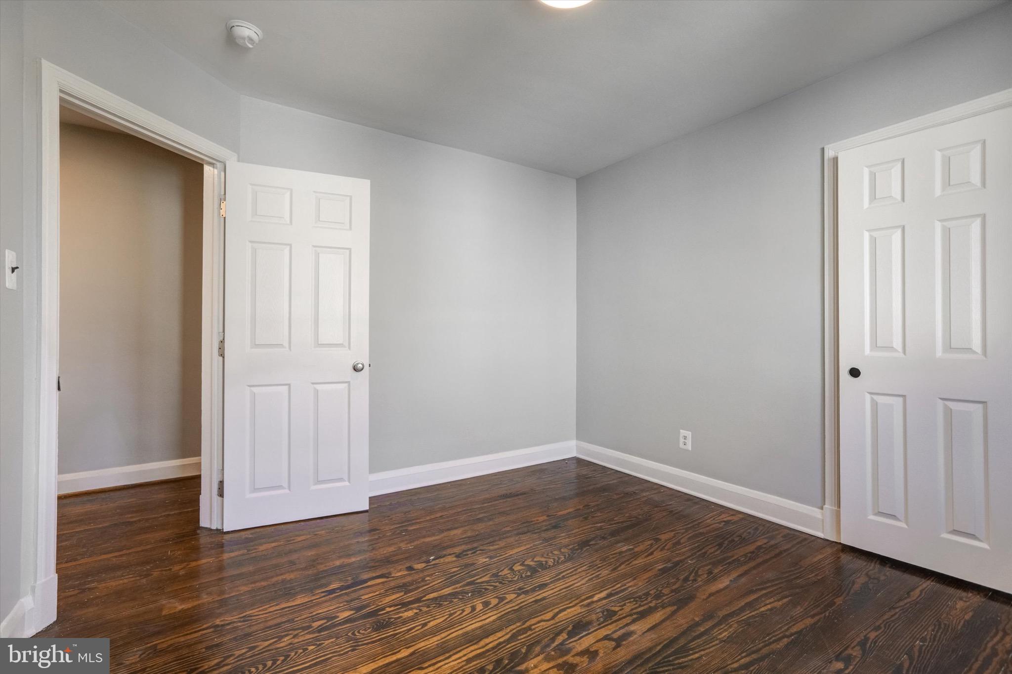 3111 Willoughby Road Baltimore, MD 21234 - Photo 27 of 45 a view of an empty room with wooden floor