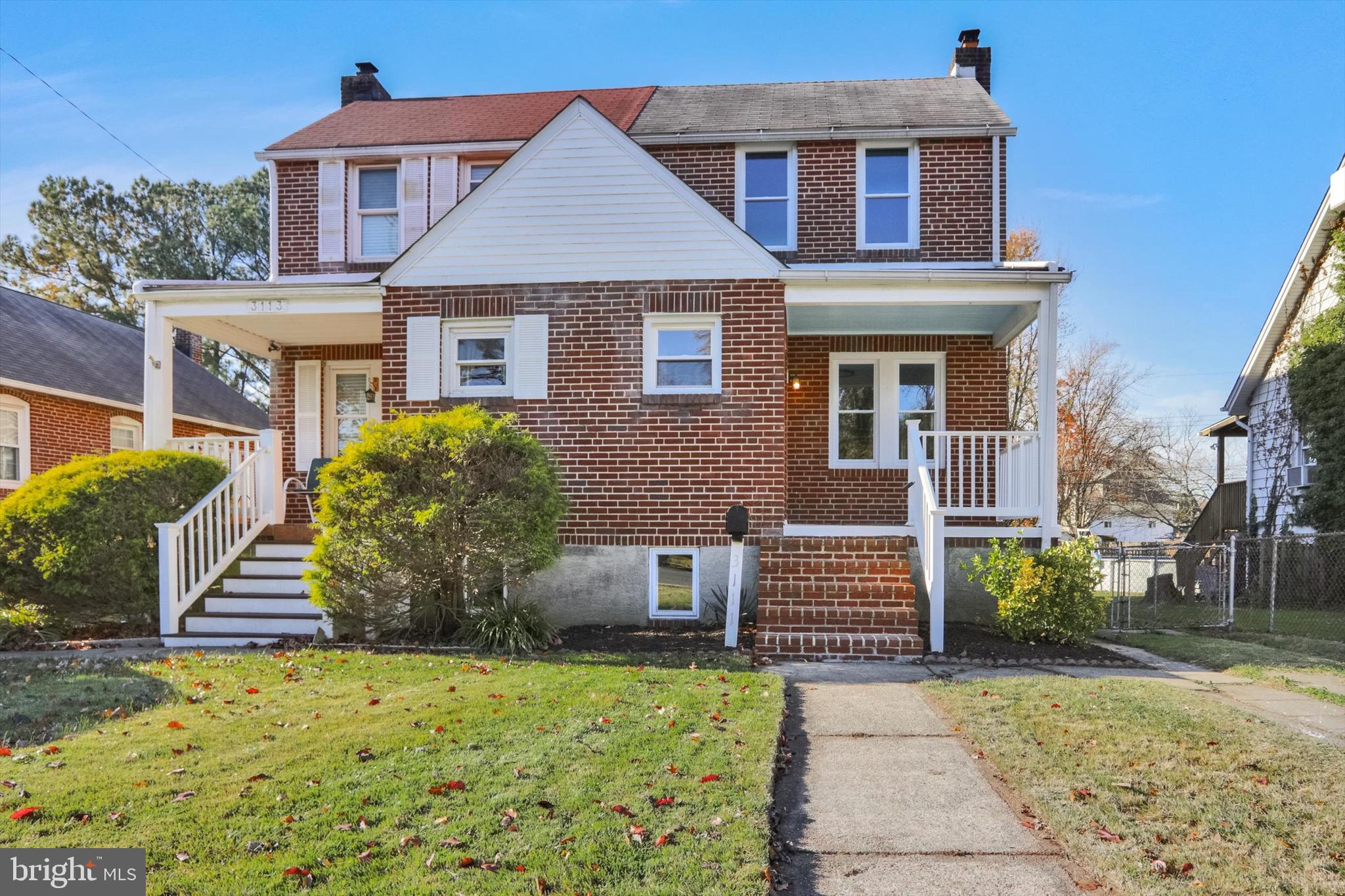 3111 Willoughby Road Baltimore, MD 21234 - Photo 3 of 45 a front view of a house with a yard