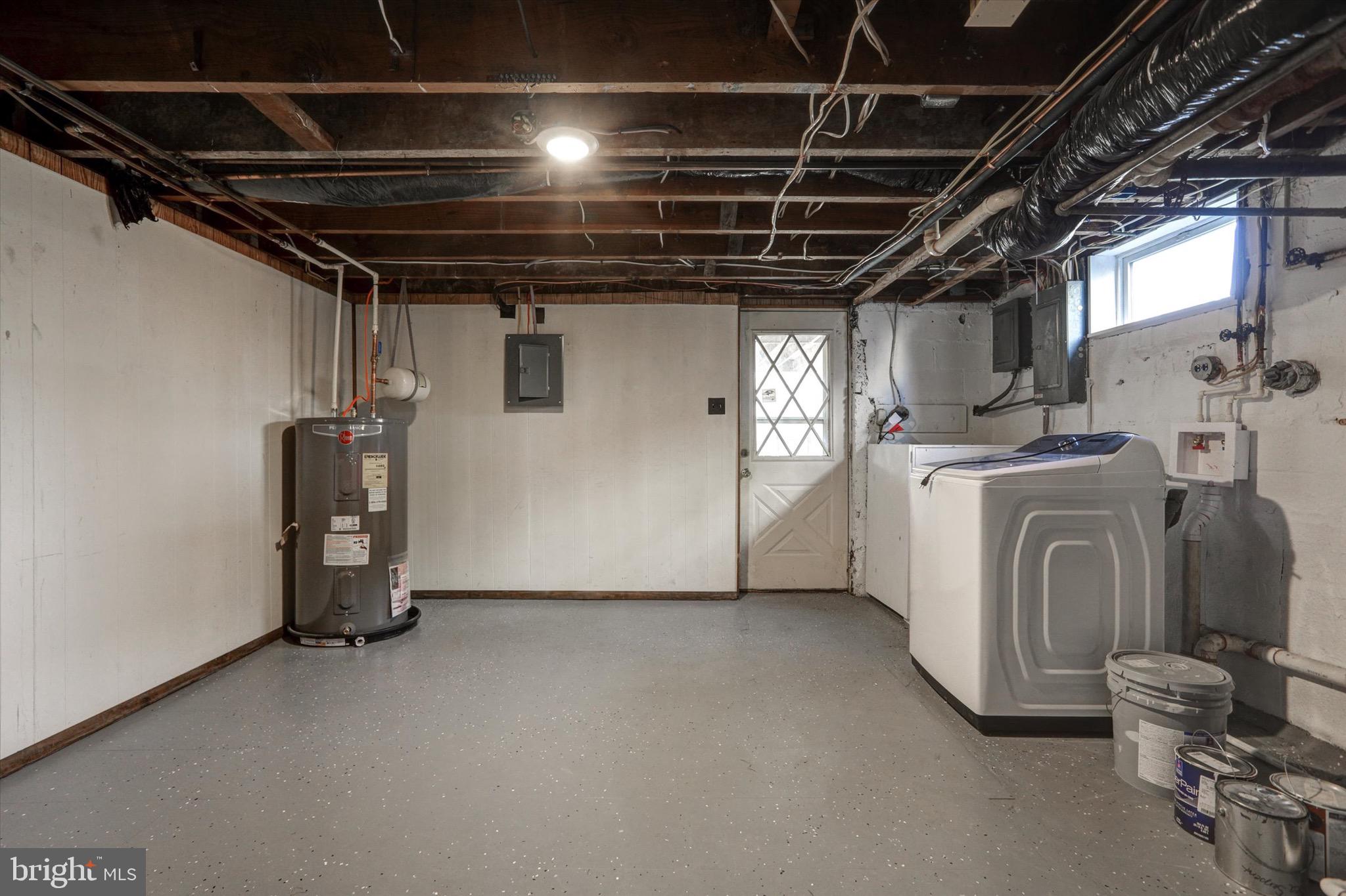 3111 Willoughby Road Baltimore, MD 21234 - Photo 38 of 45 a view of a storage & utility room with washer and dryer