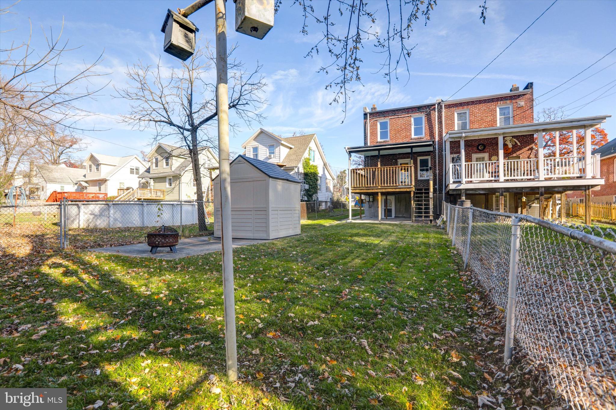 3111 Willoughby Road Baltimore, MD 21234 - Photo 42 of 45 a backyard of a house with table and chairs