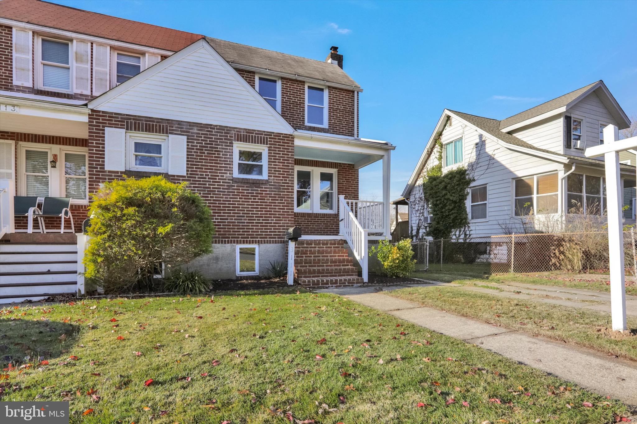 3111 Willoughby Road Baltimore, MD 21234 - Photo 5 of 45 a front view of a house with a yard