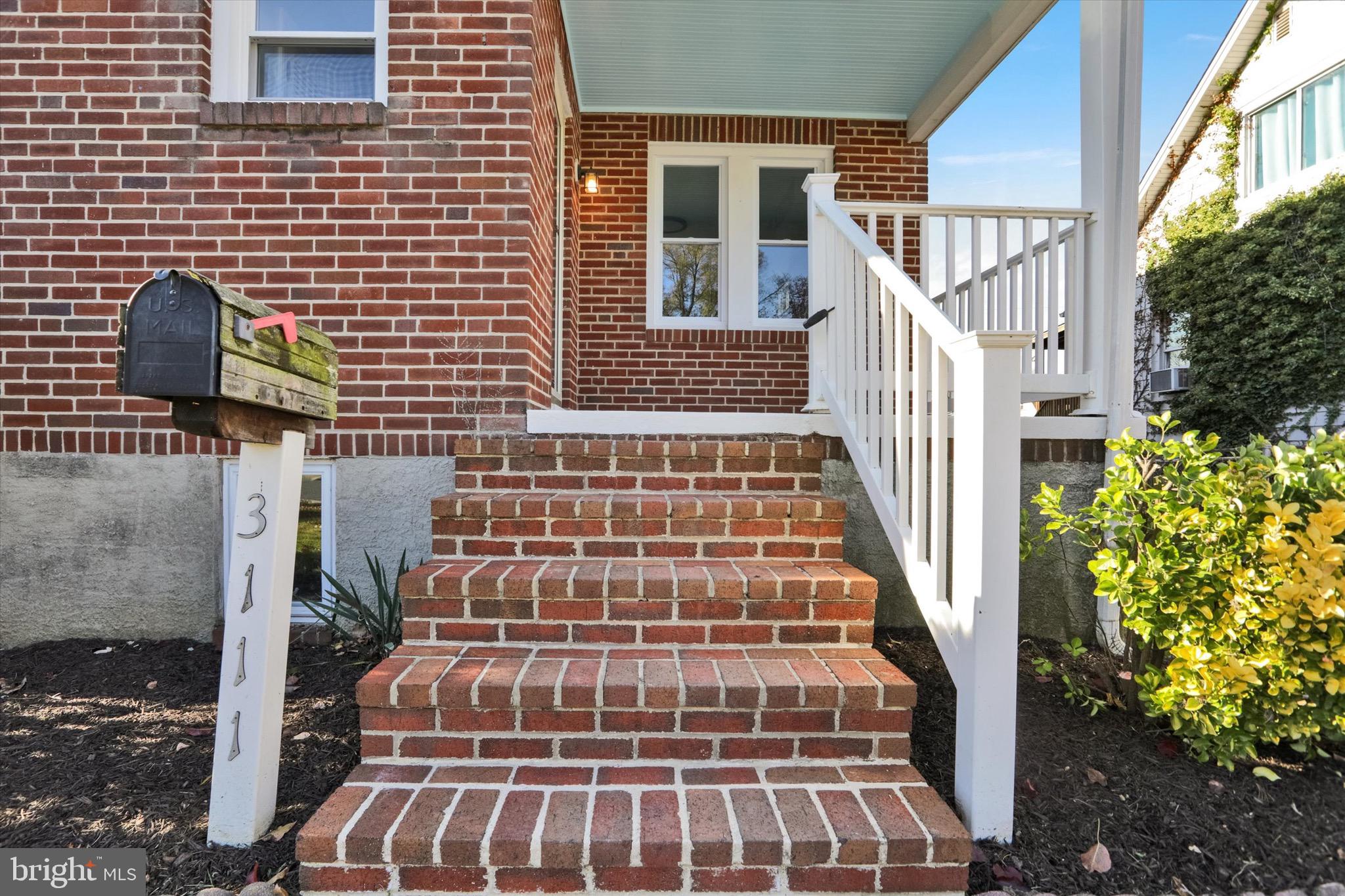 3111 Willoughby Road Baltimore, MD 21234 - Photo 6 of 45 a view of staircase with railing and a rug