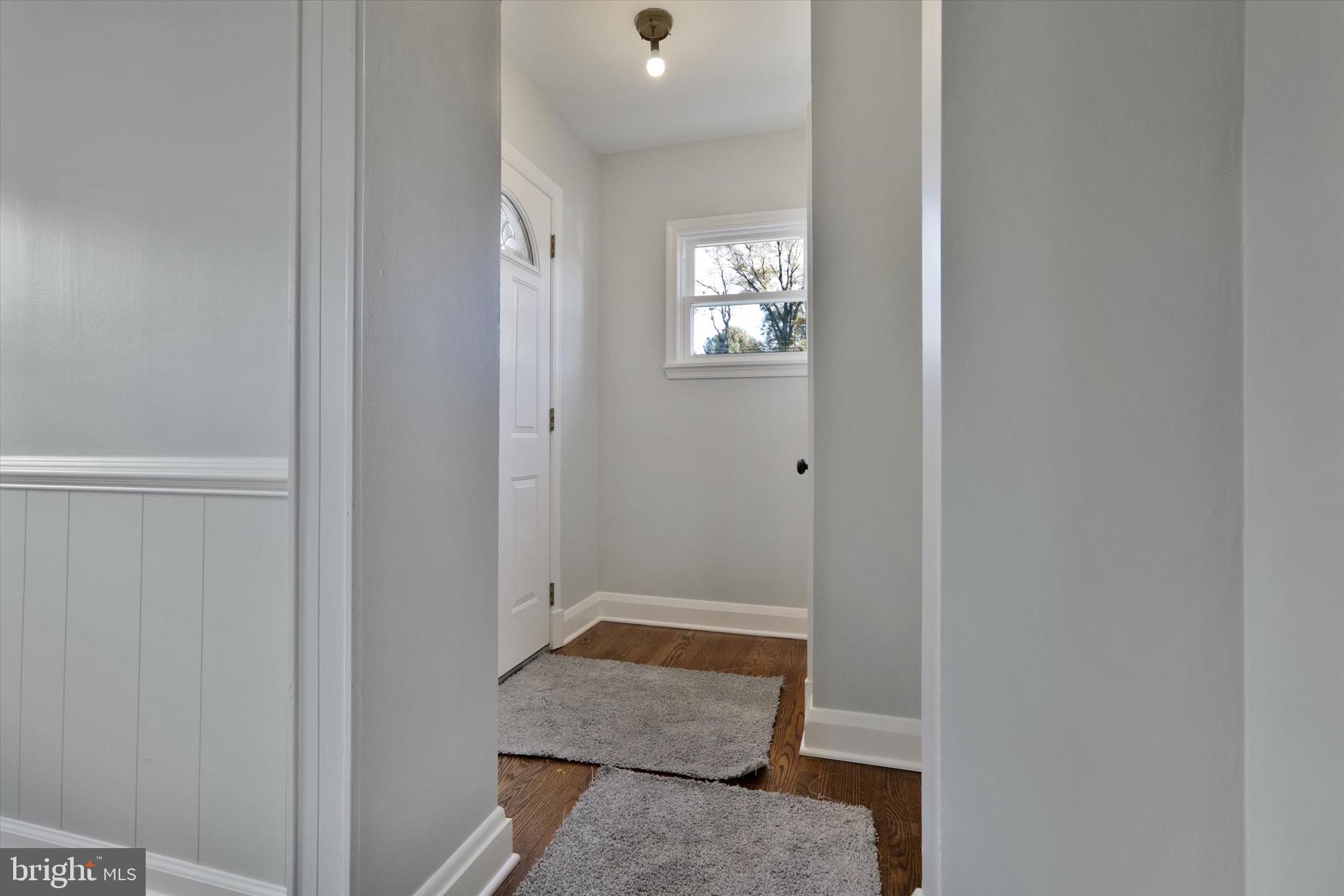 3111 Willoughby Road Baltimore, MD 21234 - Photo 8 of 45 a bathroom with a granite countertop sink and a mirror