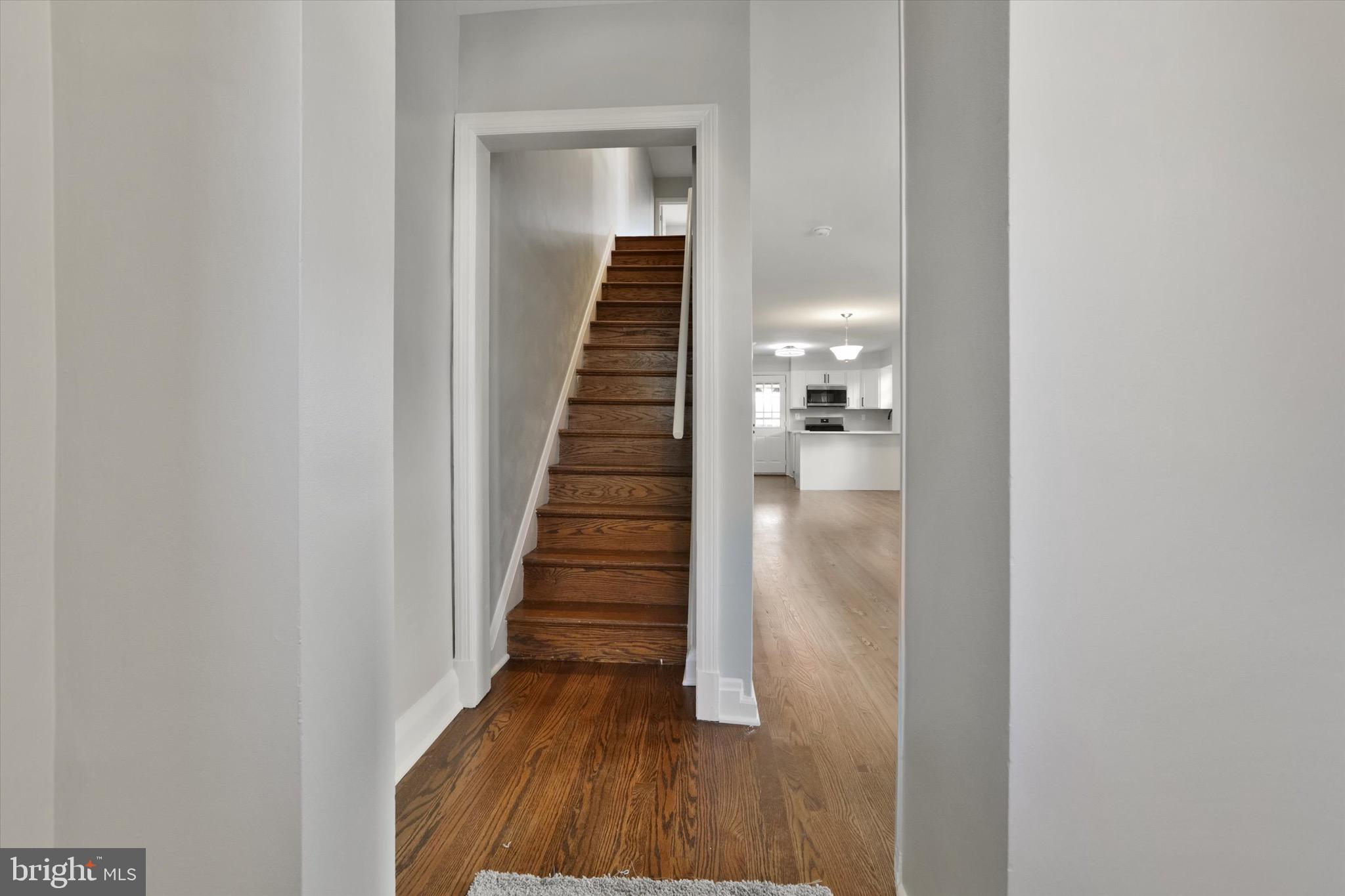 3111 Willoughby Road Baltimore, MD 21234 - Photo 9 of 45 a view of a hallway with wooden floor and entryway