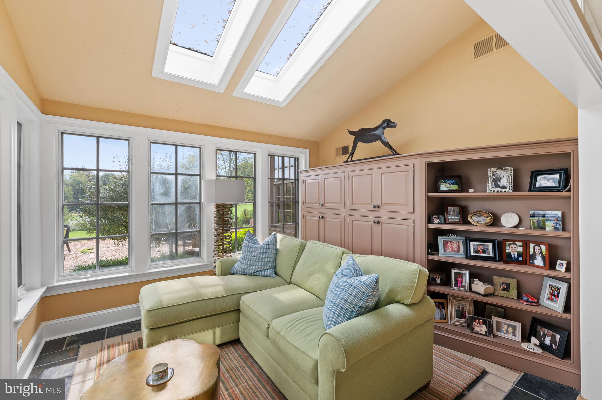 335 Boot Road Malvern, PA 19355 - Photo 16 of 65 a living room with furniture and a floor to ceiling window