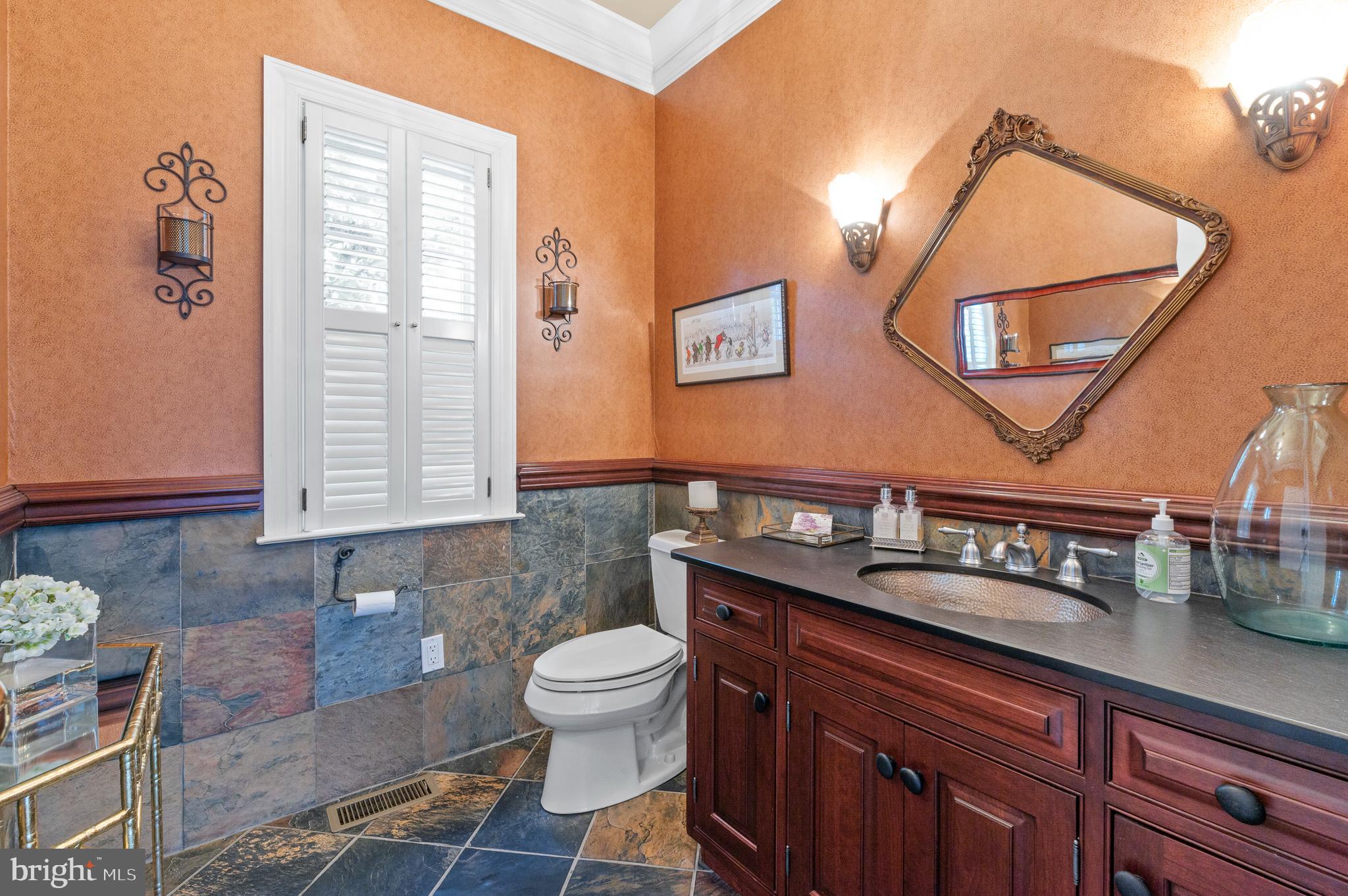 335 Boot Road Malvern, PA 19355 - Photo 21 of 65 a bathroom with a toilet a sink and mirror