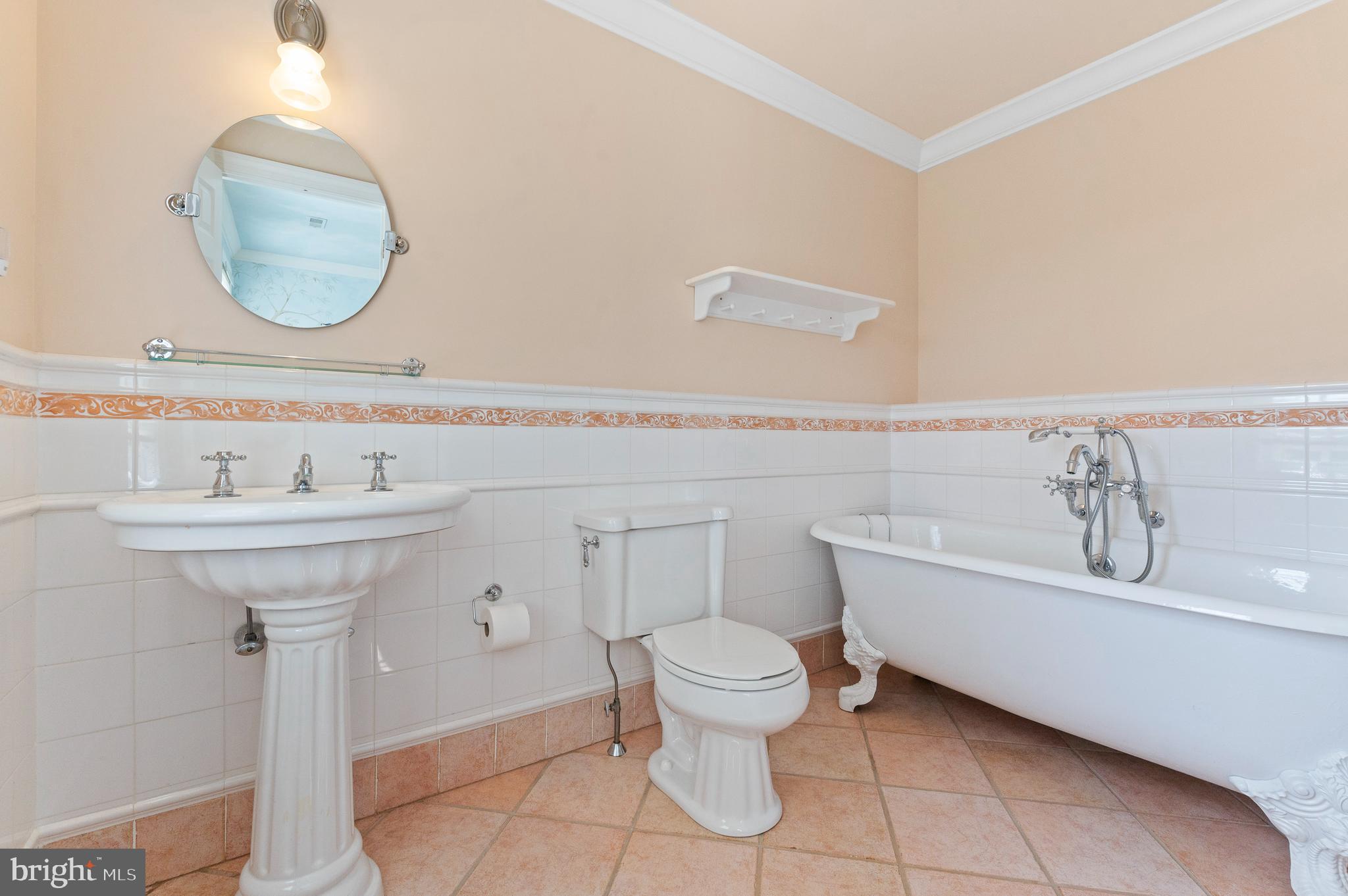 335 Boot Road Malvern, PA 19355 - Photo 36 of 65 a bathroom with a sink and a mirror