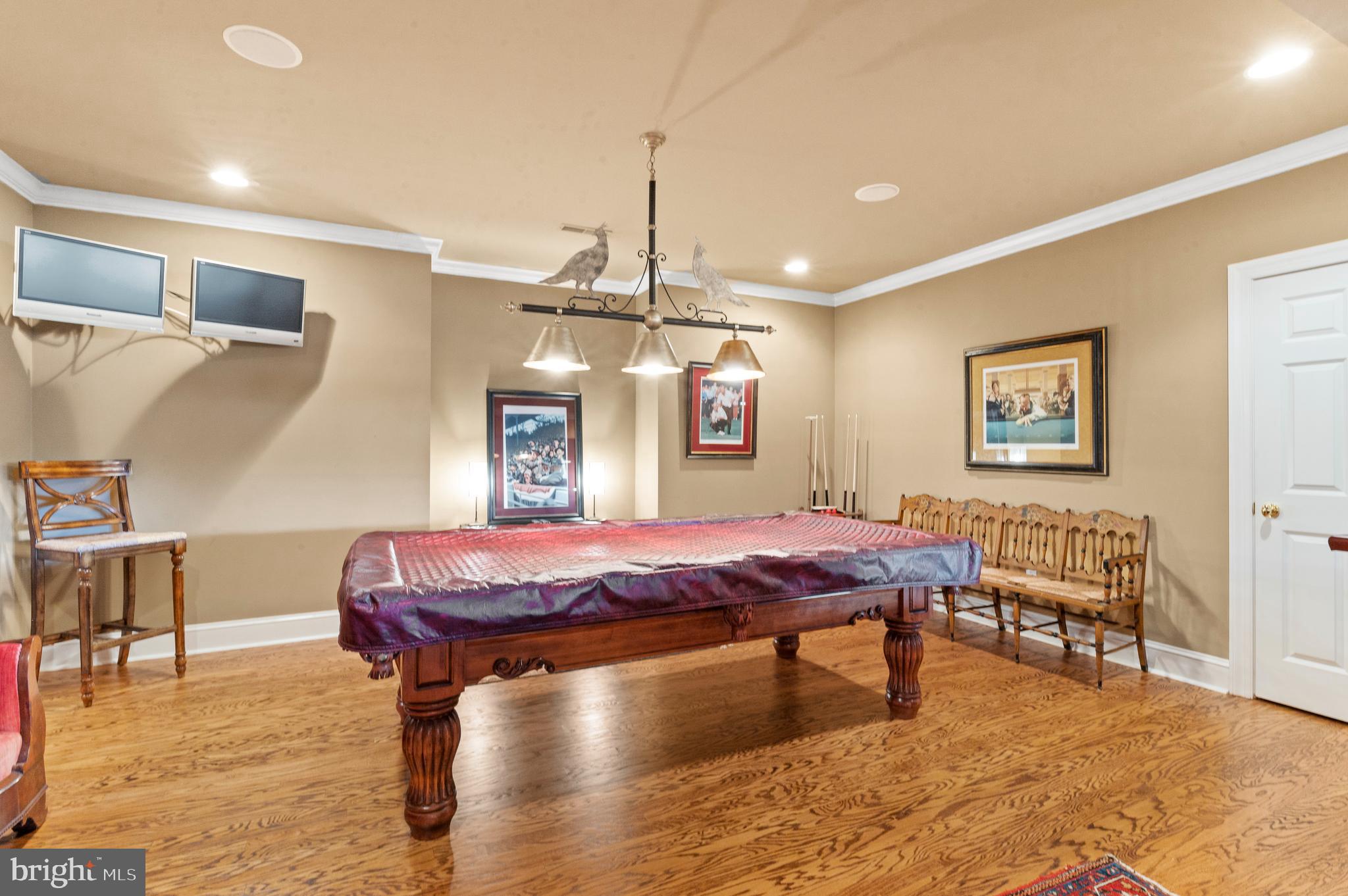 335 Boot Road Malvern, PA 19355 - Photo 52 of 65 a dining room with furniture a rug and a chandelier