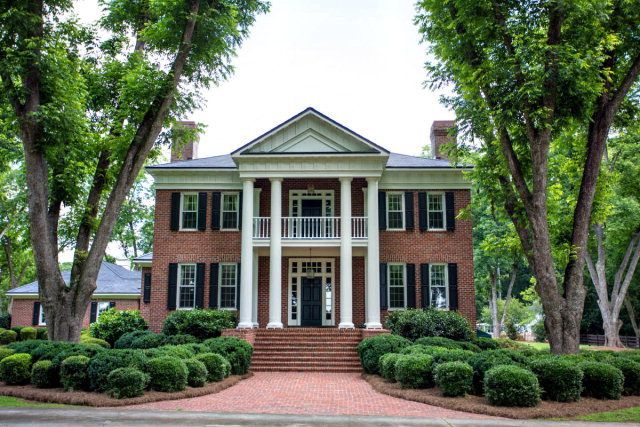 109 Rivoli Ridge Drive, Unit 239 Macon, GA 31210 - Photo 1 of 1 a front view of a house with yard and green space