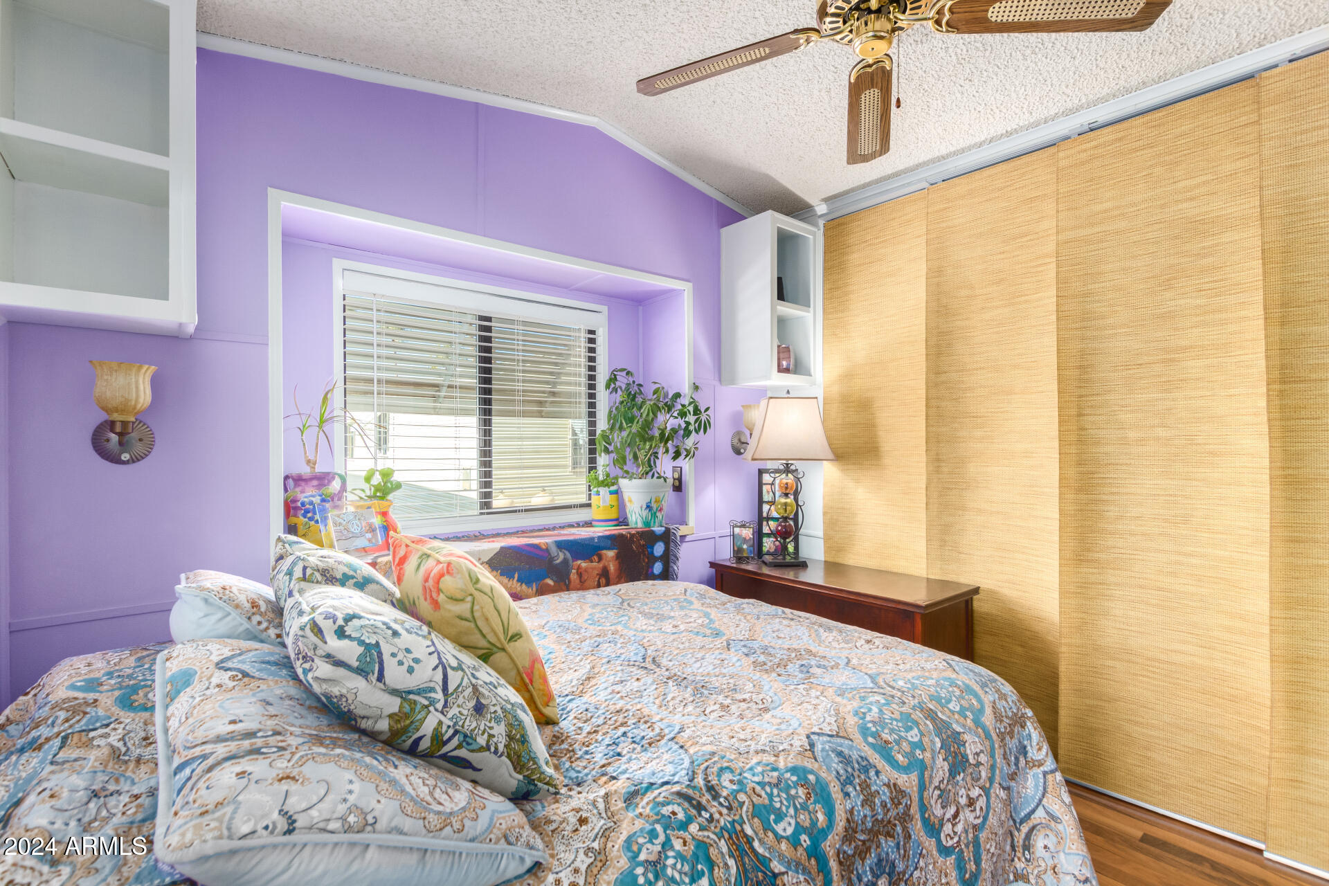 4555 South Mission Road, Unit J343 Tucson, AZ 85746 - Photo 13 of 26 a bedroom with a bed and a window