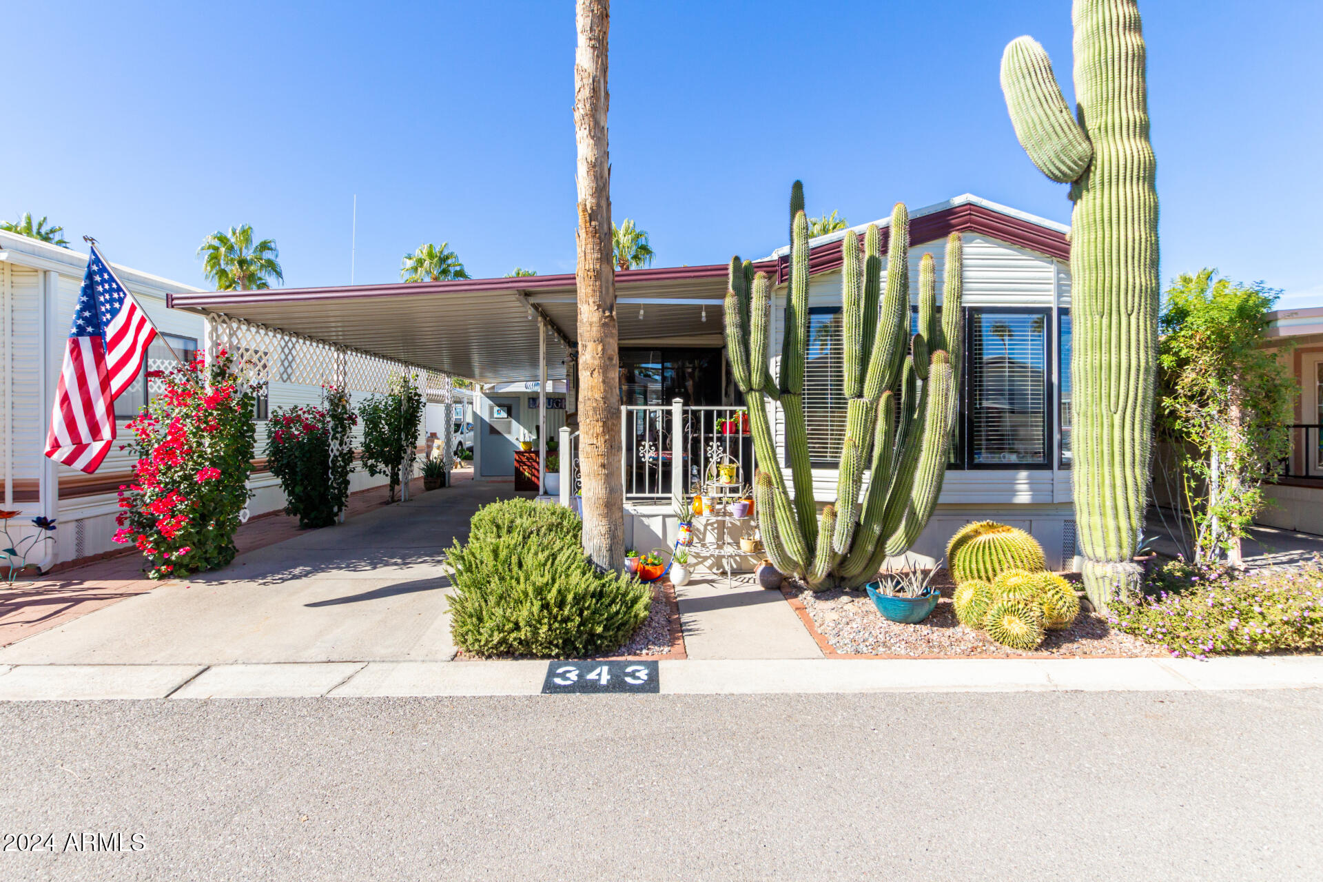 4555 South Mission Road, Unit J343 Tucson, AZ 85746 - Photo 4 of 26 a view of outdoor space and patio