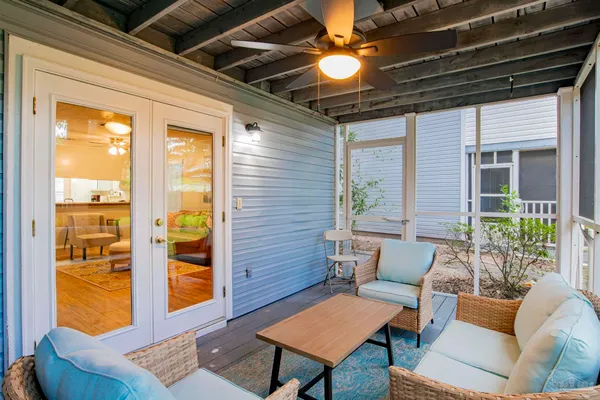 a outdoor living space with furniture and a potted plant
