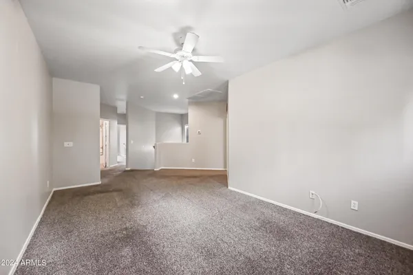 an empty room with a view of a bathroom