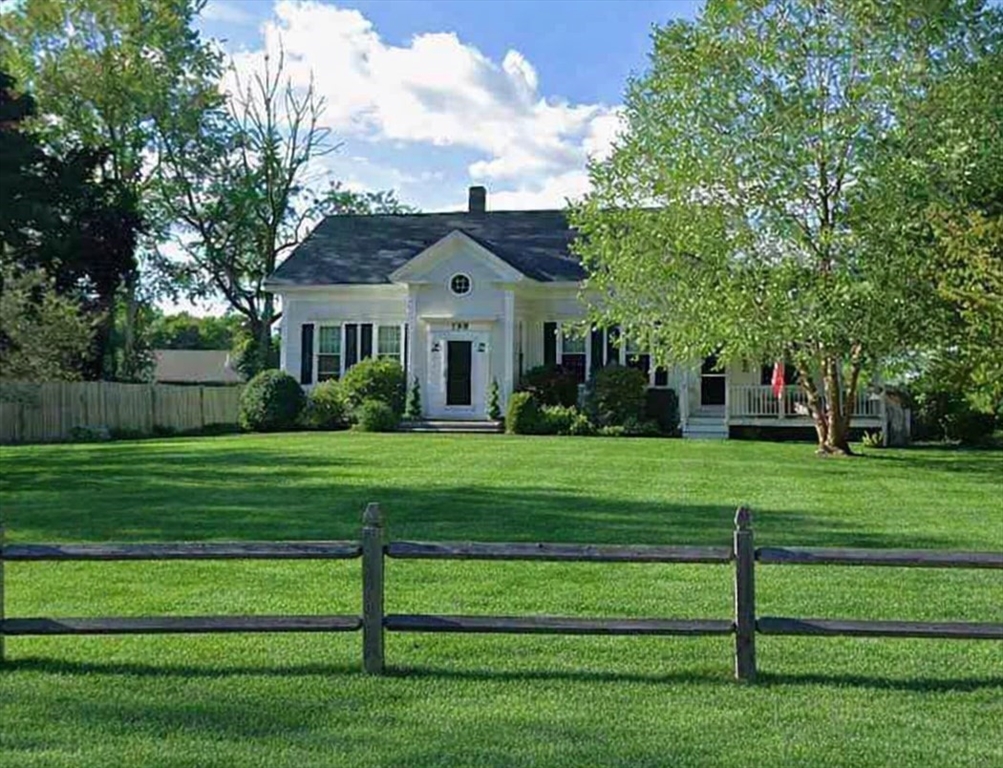 199 Rhode Island Road Lakeville, MA 02347 - Photo 1 of 30 a front view of a house with a yard