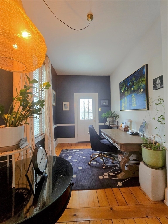 199 Rhode Island Road Lakeville, MA 02347 - Photo 14 of 30 a living room with furniture a rug and a painting on the wall