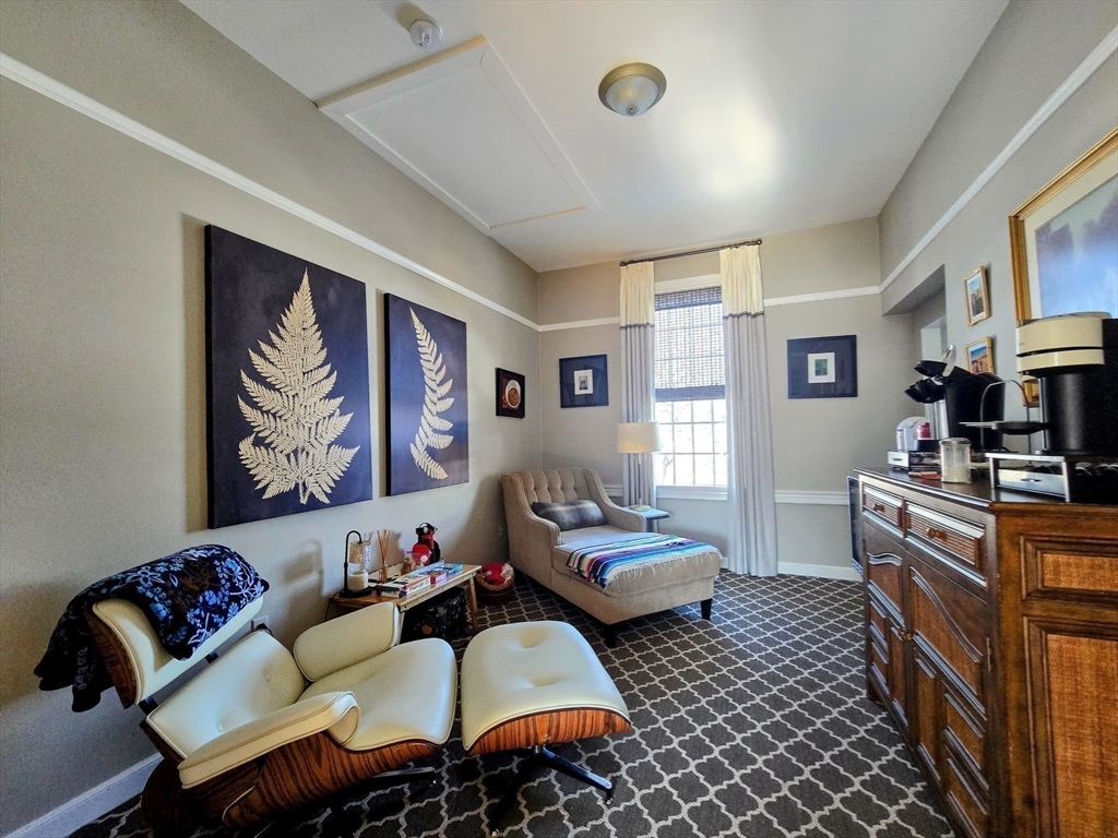 199 Rhode Island Road Lakeville, MA 02347 - Photo 16 of 30 a living room with furniture two window and a dresser