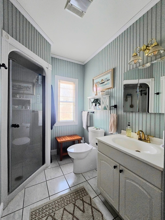199 Rhode Island Road Lakeville, MA 02347 - Photo 19 of 30 a bathroom with a sink a mirror and a shower