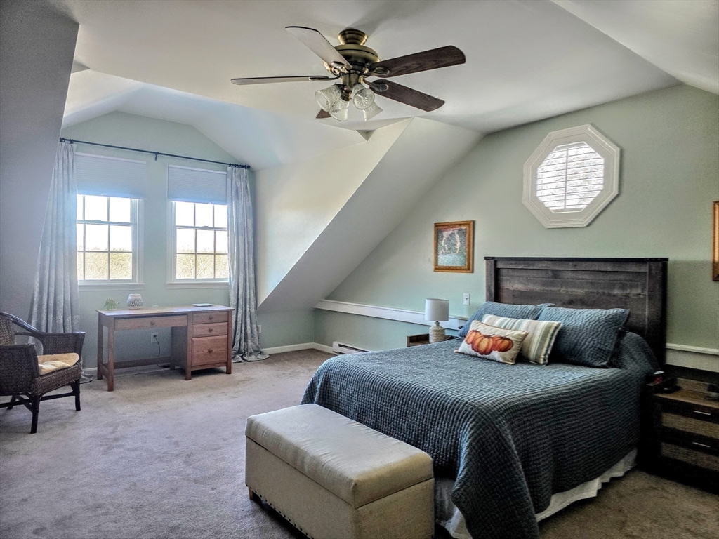 199 Rhode Island Road Lakeville, MA 02347 - Photo 21 of 30 a bedroom with bed and window