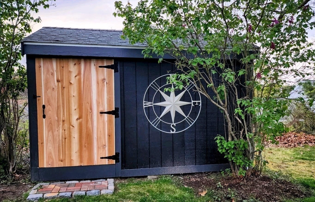 199 Rhode Island Road Lakeville, MA 02347 - Photo 26 of 30 a front view of a house with garden