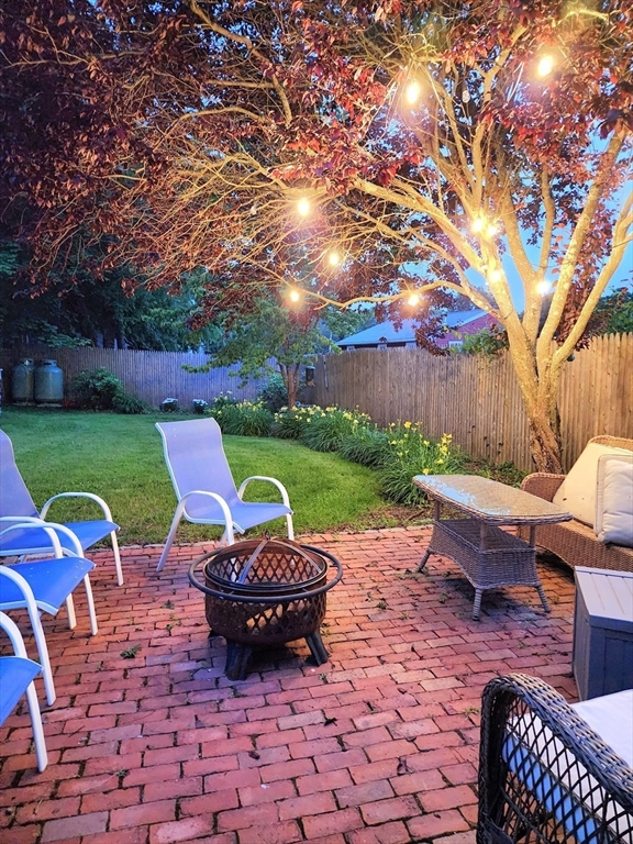 199 Rhode Island Road Lakeville, MA 02347 - Photo 3 of 30 a view of a backyard with sitting area