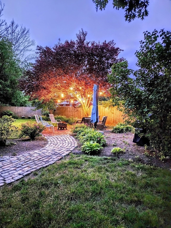 199 Rhode Island Road Lakeville, MA 02347 - Photo 4 of 30 a view of a yard with a tree