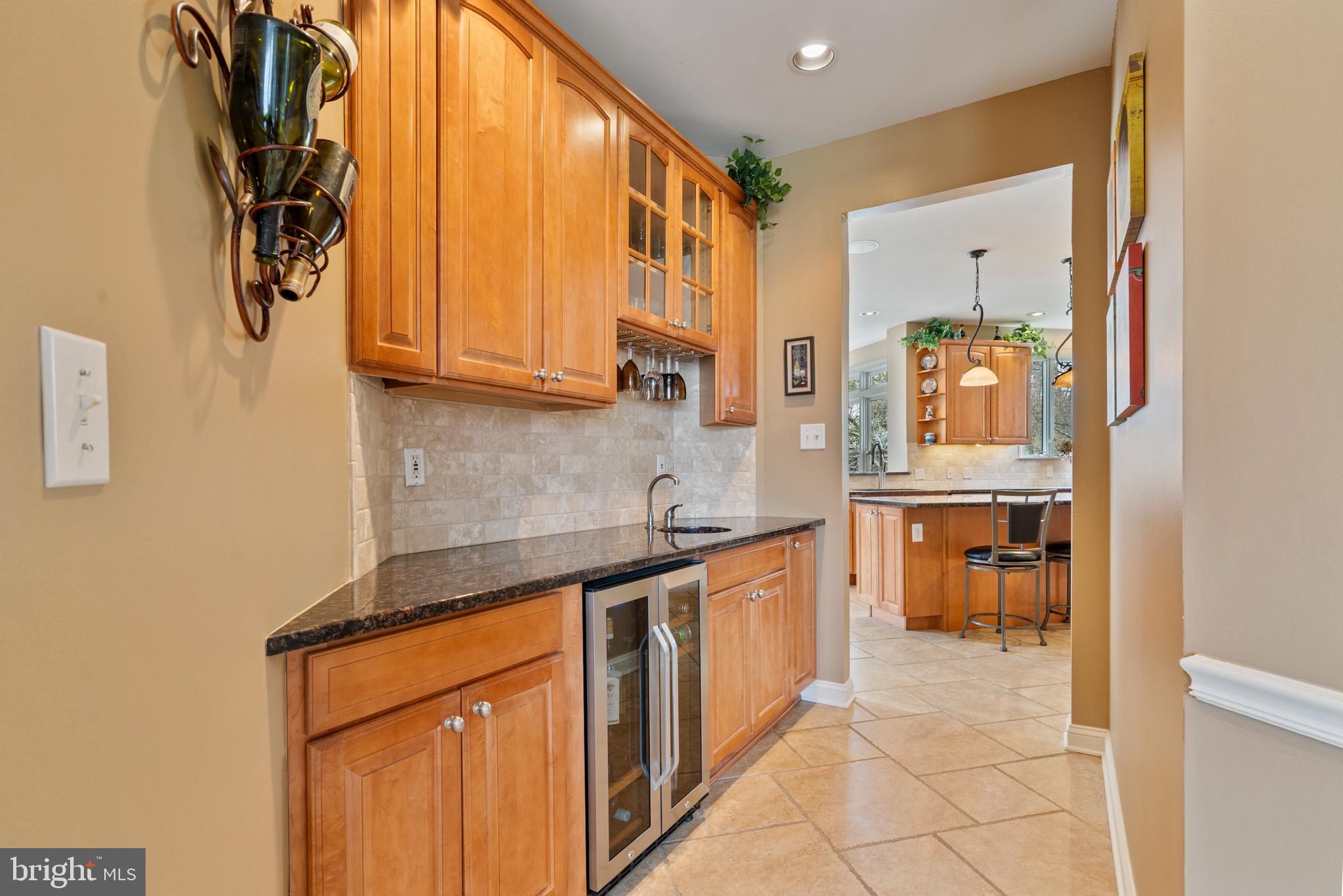 100 East Holland Road Holland, PA 18966 - Photo 13 of 63 a kitchen with stainless steel appliances granite countertop a sink and cabinets