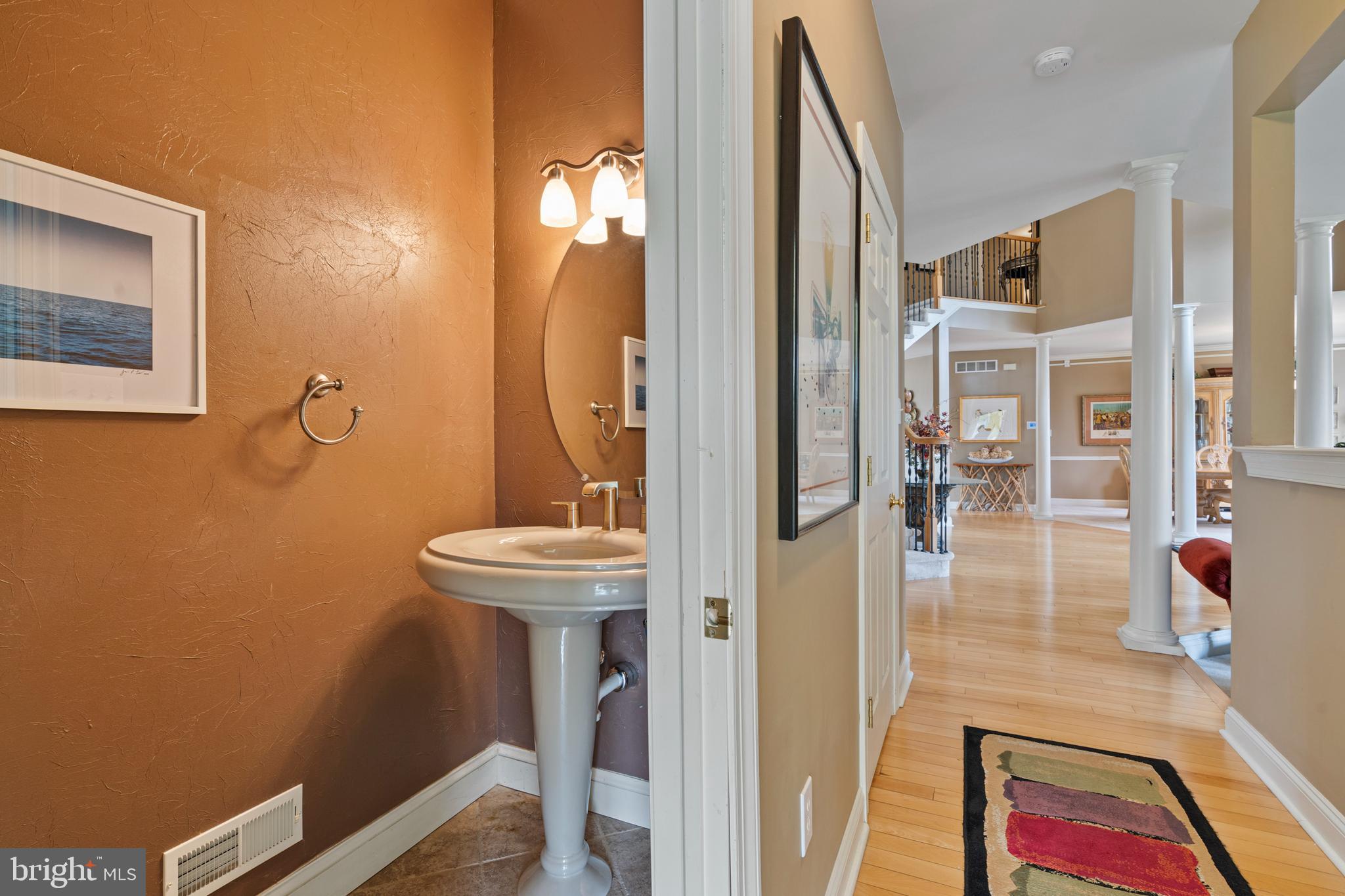 100 East Holland Road Holland, PA 18966 - Photo 19 of 63 a bathroom with a sink a mirror and shower