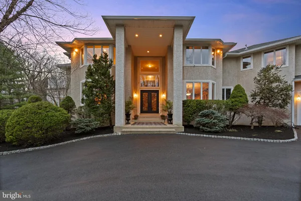 front view of a house with a street