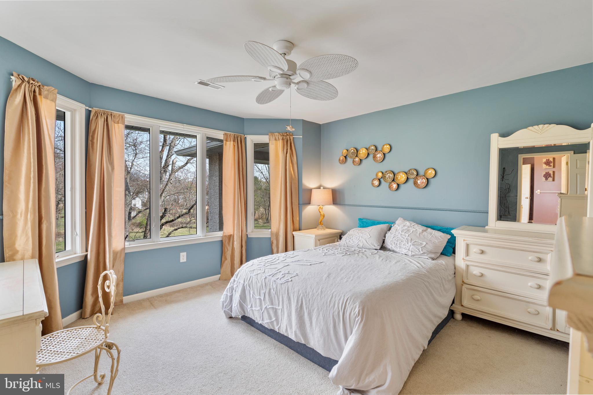 100 East Holland Road Holland, PA 18966 - Photo 30 of 63 a bedroom with a bed and a large window