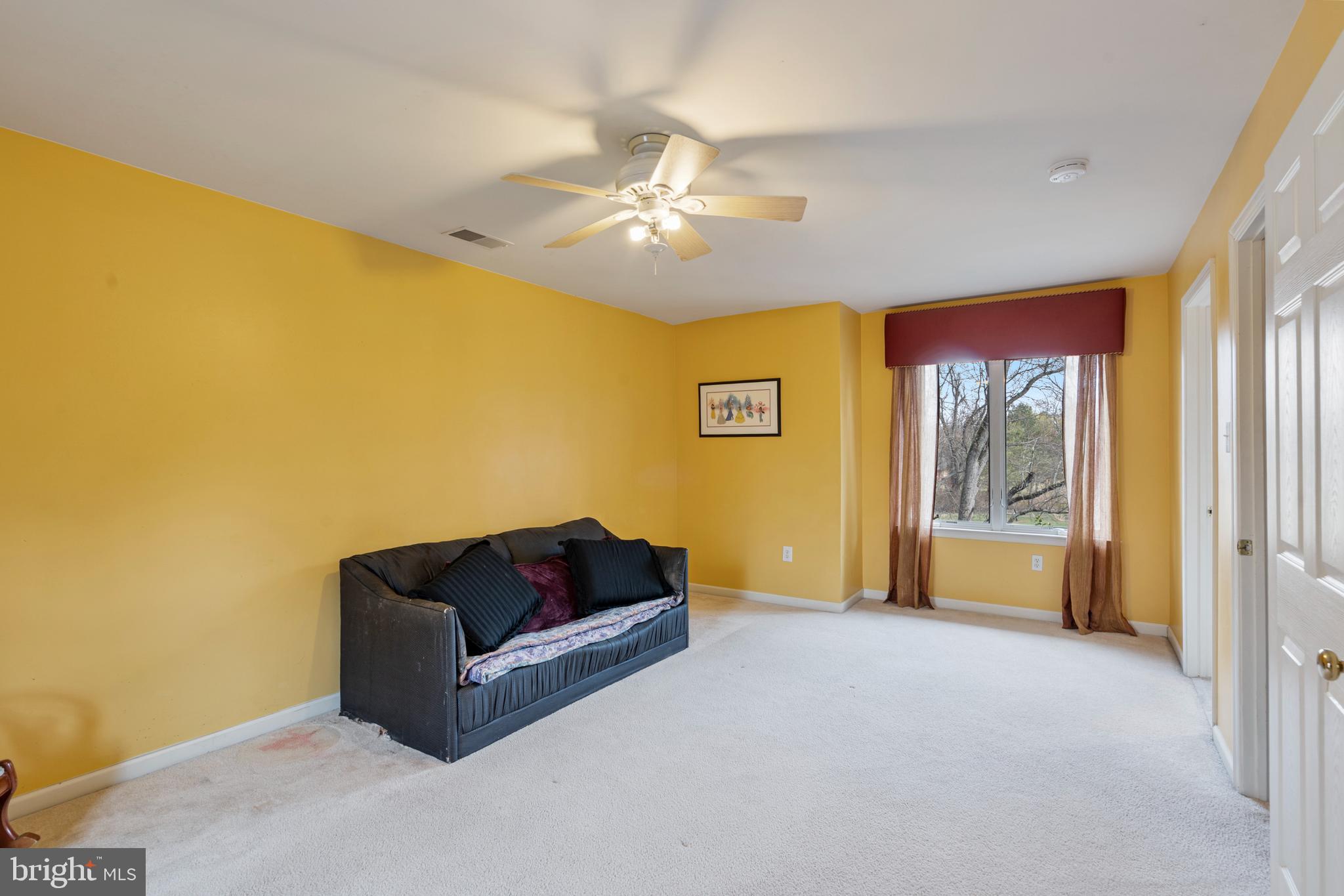 100 East Holland Road Holland, PA 18966 - Photo 32 of 63 a living room with furniture and a large window