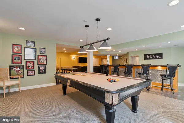 a outdoor dining space with furniture and garden view