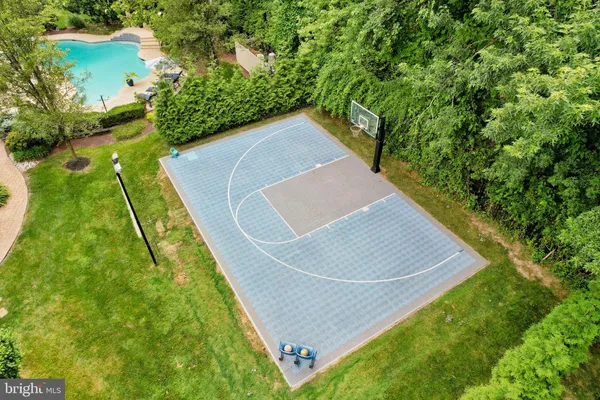 a view of swimming pool with trees
