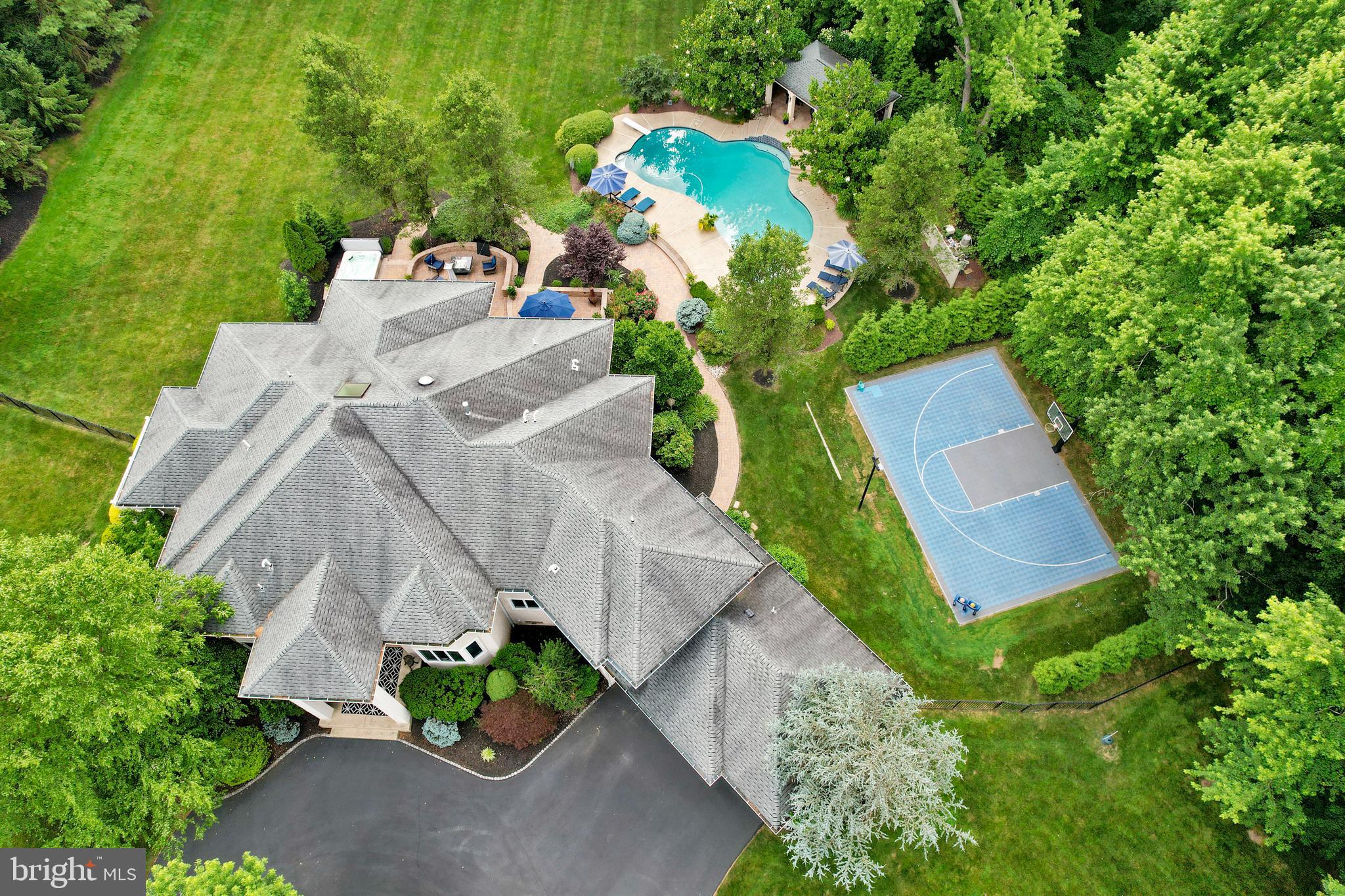 100 East Holland Road Holland, PA 18966 - Photo 50 of 63 an aerial view of a house with a yard and garden