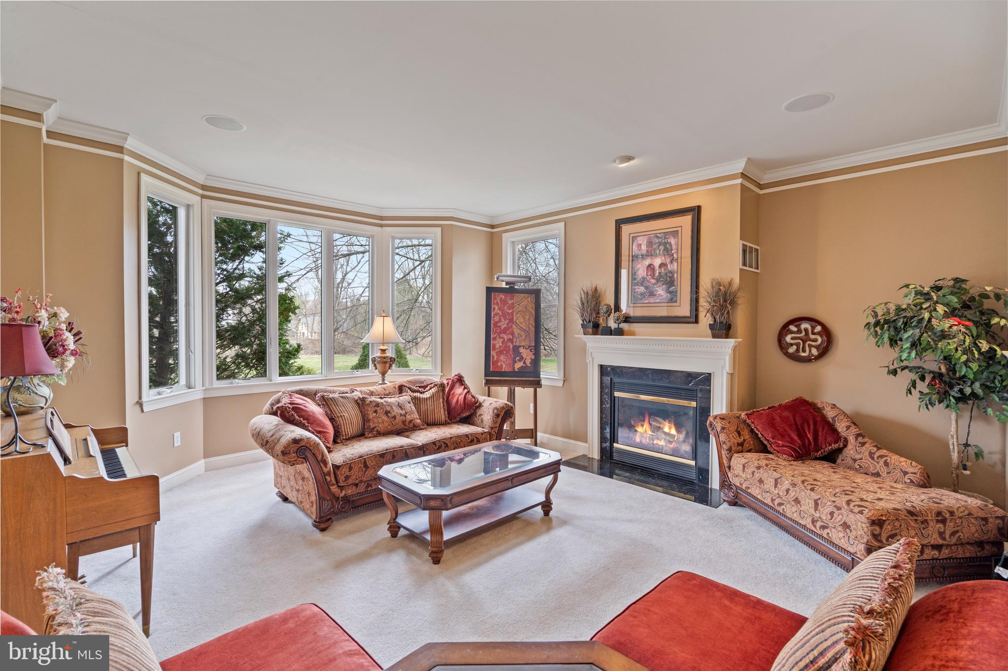100 East Holland Road Holland, PA 18966 - Photo 5 of 63 a living room with furniture fireplace and a large window