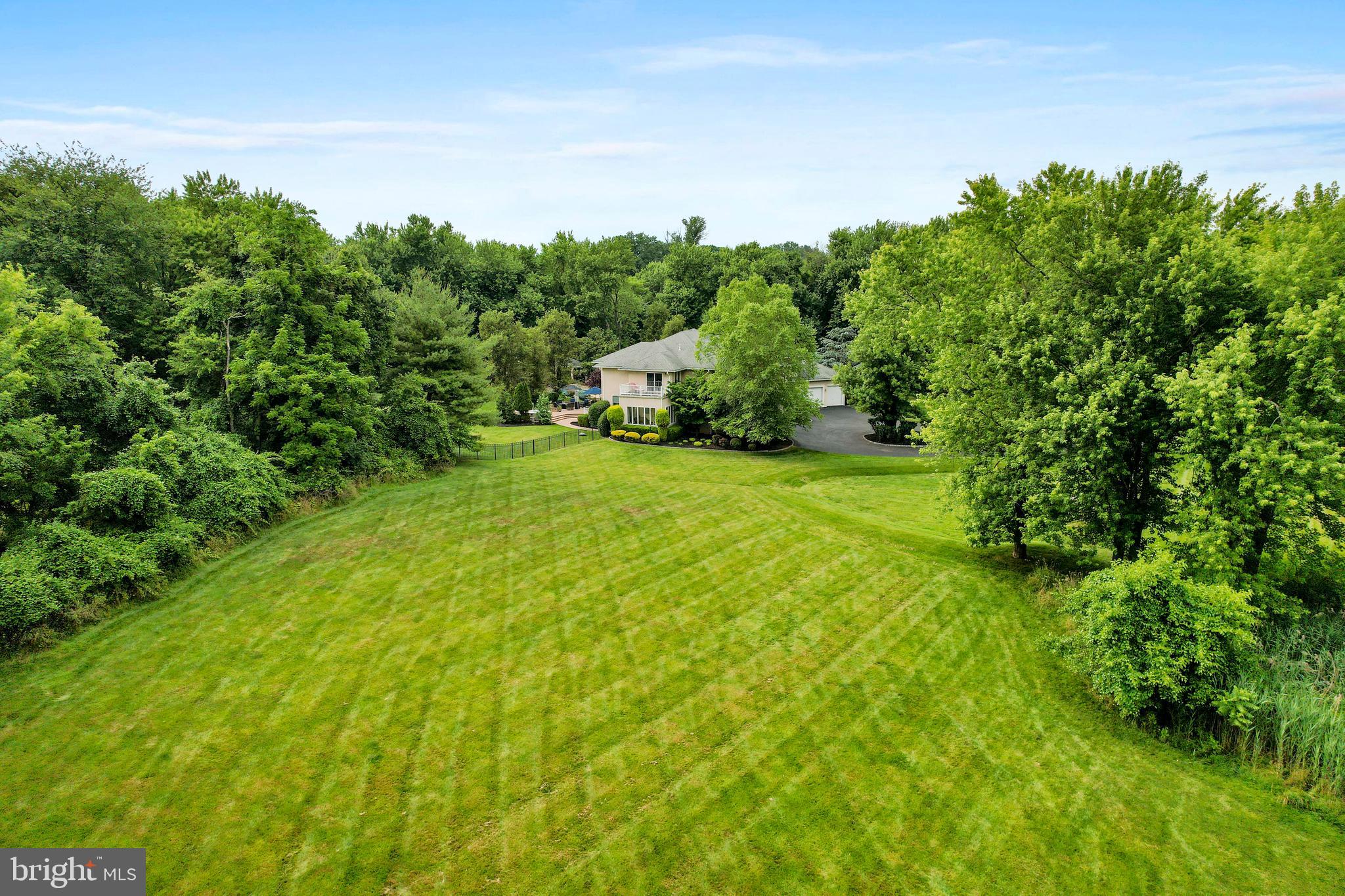 100 East Holland Road Holland, PA 18966 - Photo 53 of 63 a view of a big yard with large trees