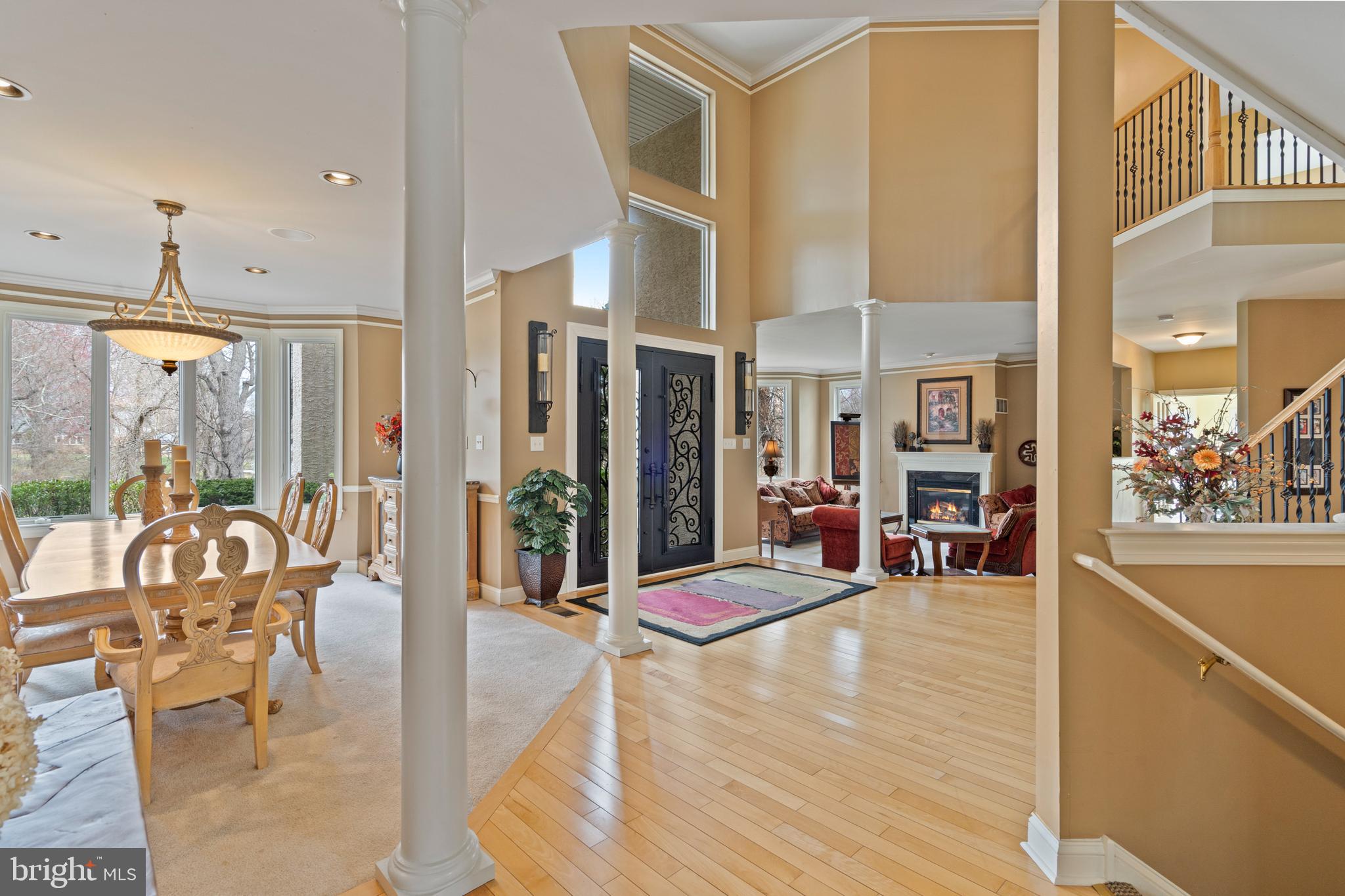 100 East Holland Road Holland, PA 18966 - Photo 7 of 63 a living room with furniture a flat screen tv and floor to ceiling window