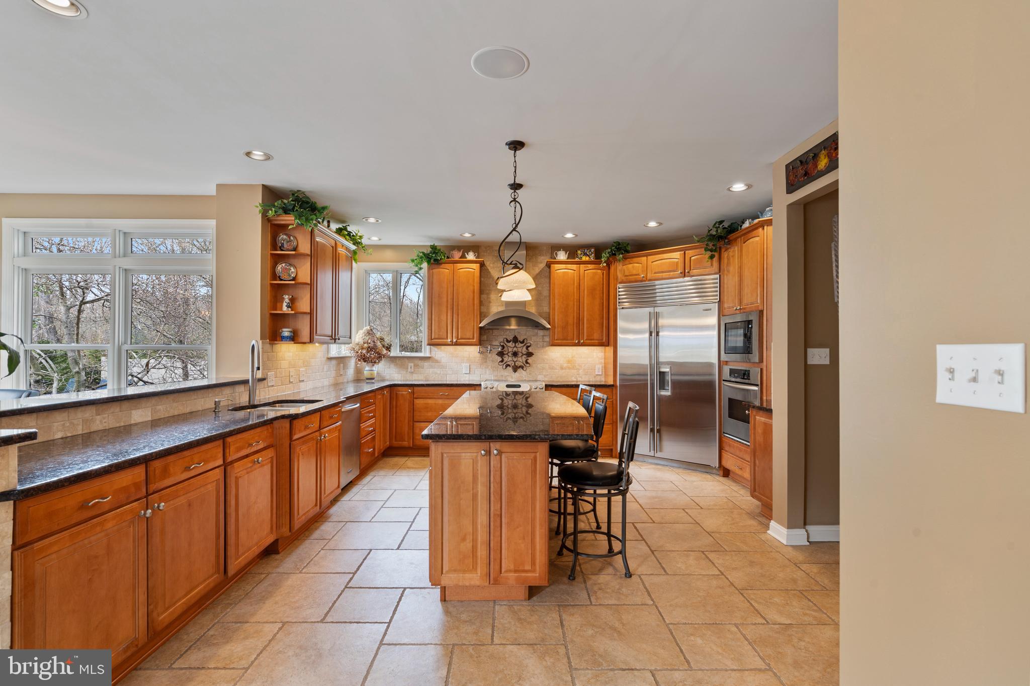 100 East Holland Road Holland, PA 18966 - Photo 9 of 63 a large kitchen with lots of counter space and windows