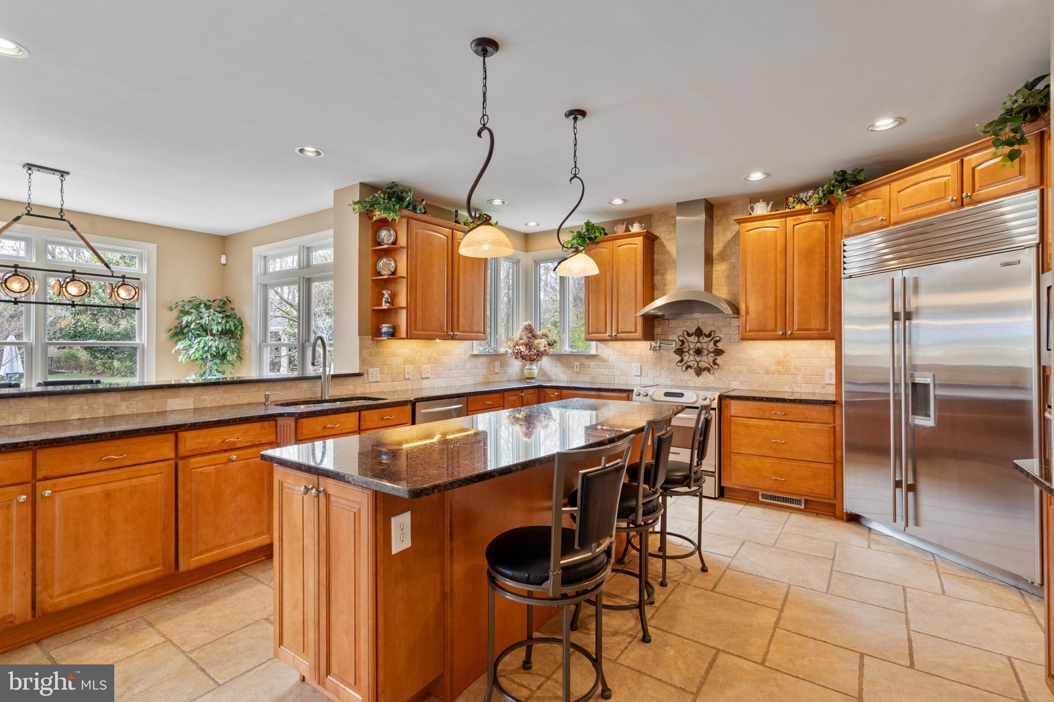 100 East Holland Road Holland, PA 18966 - Photo 10 of 63 a dining table chairs and a chandelier