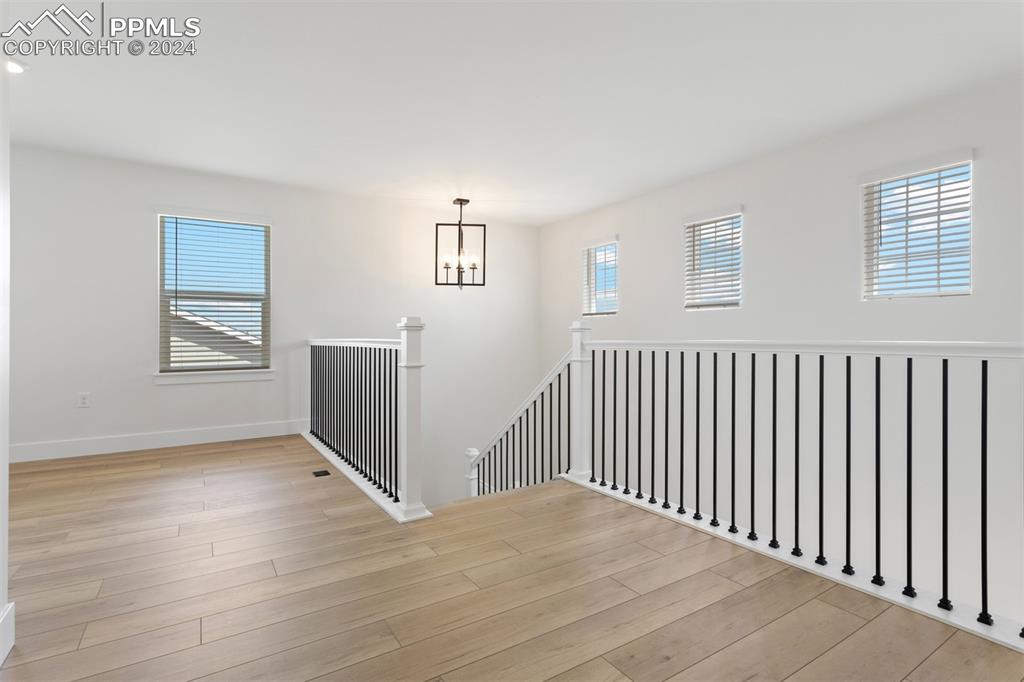 42972 Colonial Trail Elizabeth, CO 80107 - Photo 6 of 17 a view of a livingroom with wooden floor and a window
