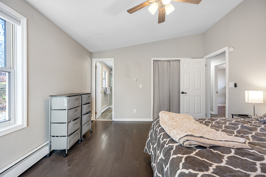 437 Somers Road Ellington, CT 06029 - Photo 17 of 40 a bedroom with a bed and a window