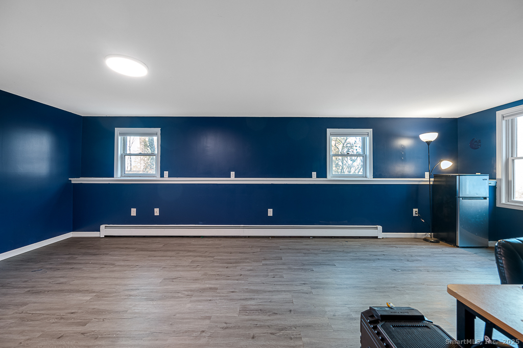 437 Somers Road Ellington, CT 06029 - Photo 21 of 40 a view of a livingroom with furniture