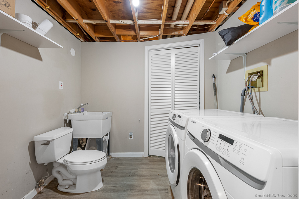 437 Somers Road Ellington, CT 06029 - Photo 27 of 40 a utility room with dryer and washer