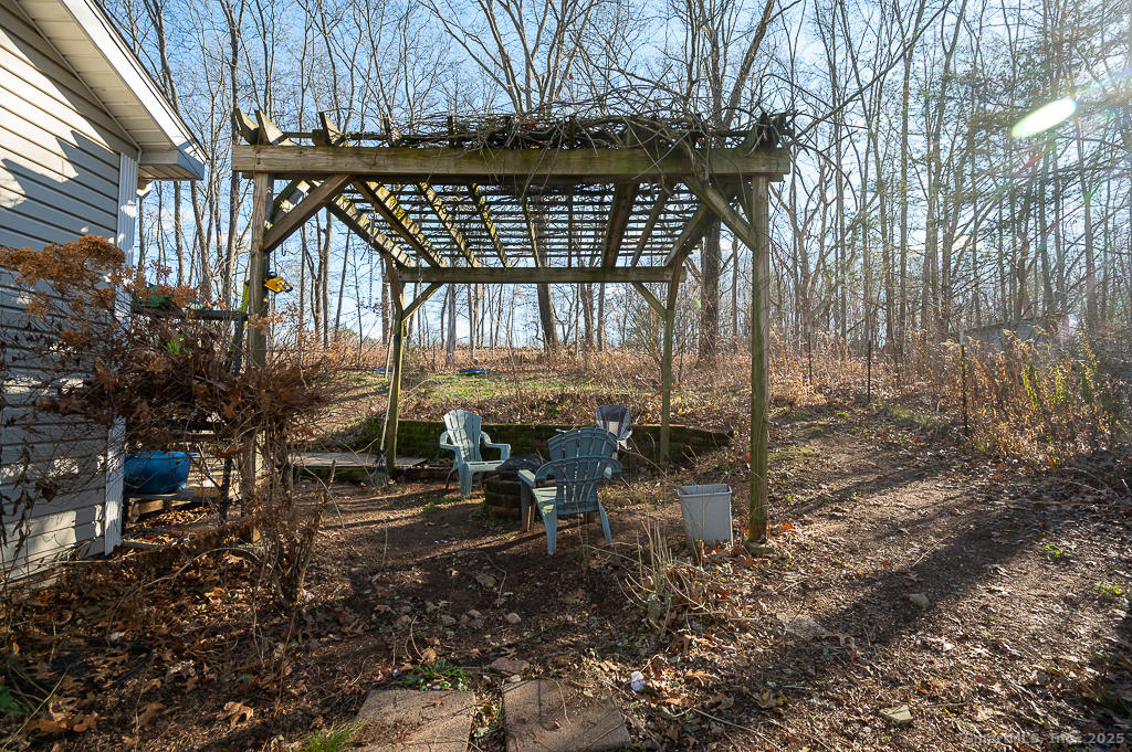 437 Somers Road Ellington, CT 06029 - Photo 35 of 40 a view of swimming pool with outdoor seating
