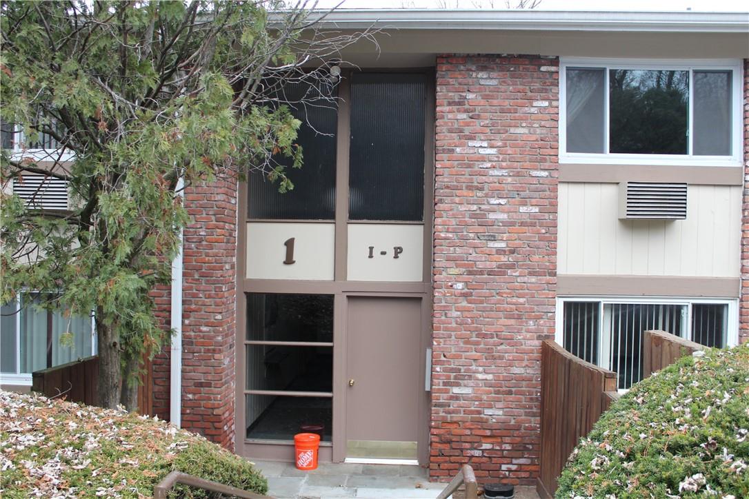 1 Rolling Way, Unit K Peekskill, NY 10566 - Photo 1 of 1 a front view of a house with a yard