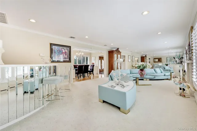 a kitchen with stainless steel appliances granite countertop a sink a stove and a wooden floors