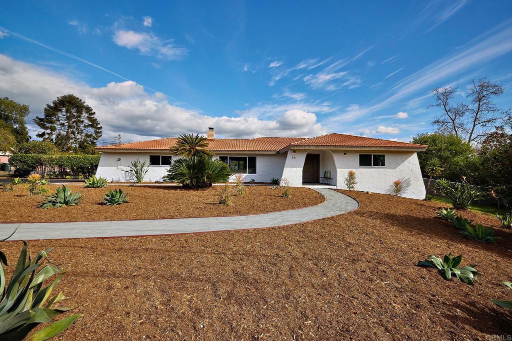 341 Cole Ranch Road Encinitas, CA 92024 - Photo 14 of 44 a view of house with yard