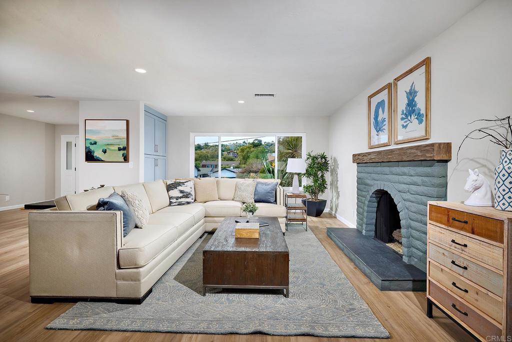 341 Cole Ranch Road Encinitas, CA 92024 - Photo 16 of 44 a living room with furniture and a fireplace