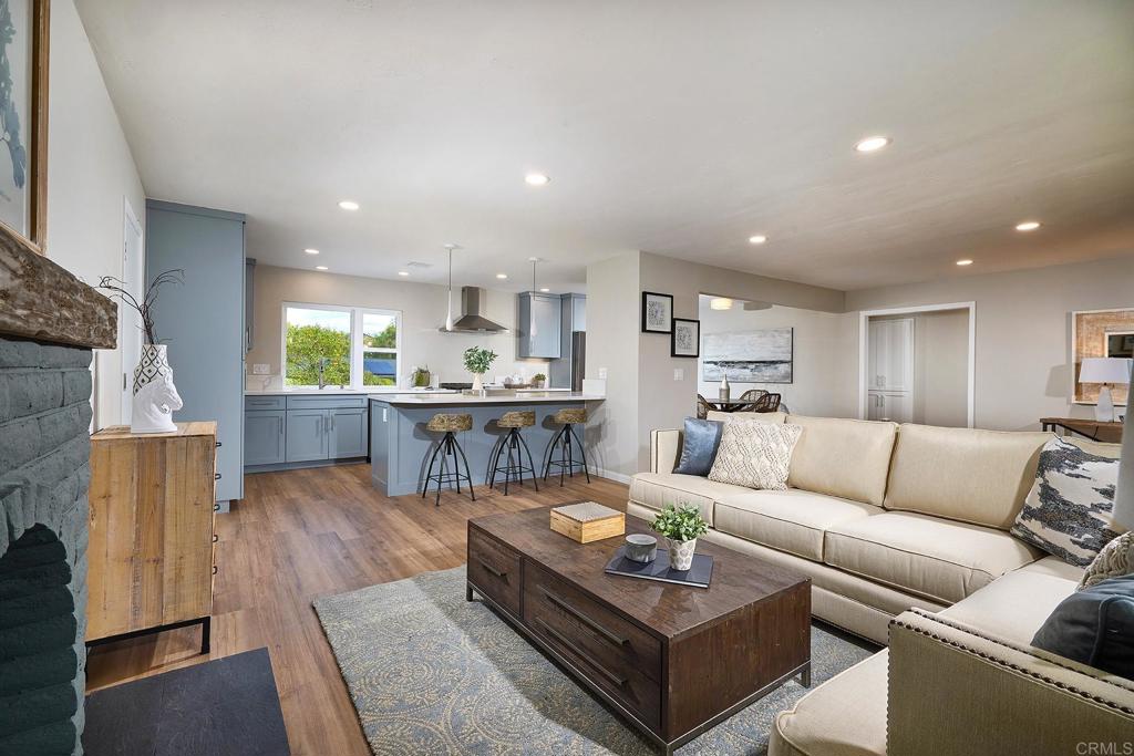 341 Cole Ranch Road Encinitas, CA 92024 - Photo 18 of 44 a living room with furniture and a wooden floor