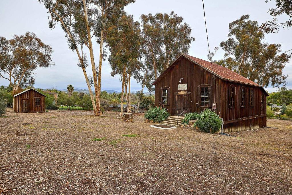 341 Cole Ranch Road Encinitas, CA 92024 - Photo 43 of 44 a view of a house with a yard and pathway