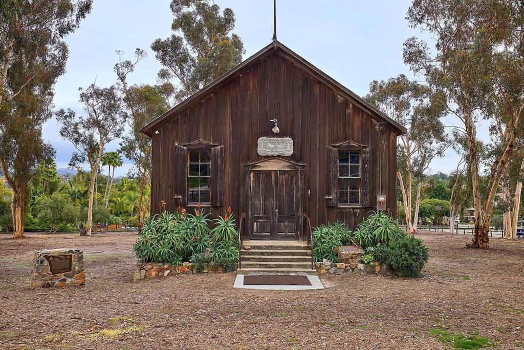 341 Cole Ranch Road Encinitas, CA 92024 - Photo 44 of 44 a front view of a house with a yard